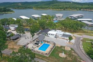 an aerial view of a house with a swimming pool at Wake Zone Lighthouse Lodge - Lake Views in Kimberling City