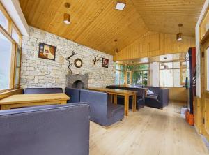 Χώρος καθιστικού στο Hotel Purnima Kasol