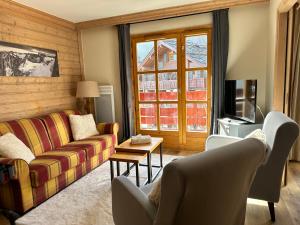 Posezení v ubytování La Marmotte ARC 1950