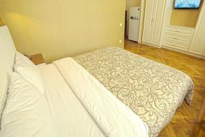 Кровать или кровати в номере Apart Hotel Kvartira 1