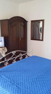 Postel nebo postele na pokoji v ubytování L'Antico Carrettiere