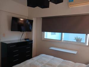 Televisyen dan/atau pusat hiburan di Oasis Lodging