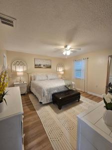 a bedroom with a bed and a table in it at Hillside Retreat in Knoxville