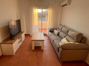 A television and/or entertainment centre at Alma de Cómpeta