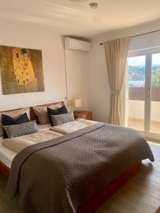 Ένα ή περισσότερα κρεβάτια σε δωμάτιο στο Villa Noma