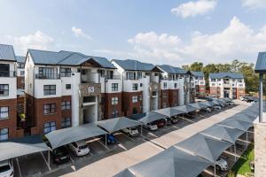 an aerial view of a row of apartment buildings at Nom’s Amsterdam in Northriding