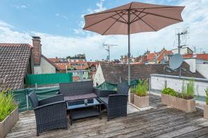 Balkón nebo terasa v ubytování Ferienwohnungen Spiegel - Fewo mit Dachterrasse Mediterran 3