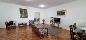 TV a/nebo společenská místnost v ubytování Casa Praiana