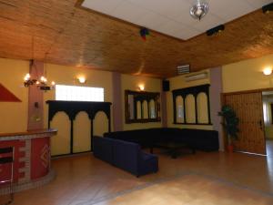 Posedenie v ubytovaní Hacienda Doña Lola