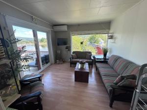 Posezení v ubytování Snåsa Bryggehage - Top apartment
