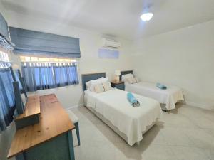 Katil atau katil-katil dalam bilik di 9 Margate Gardens +8 gambar