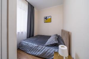 Voodi või voodid majutusasutuse Forest view front line apartment on Dzintaru prospekts toas