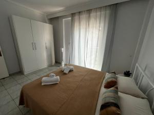 Ένα ή περισσότερα κρεβάτια σε δωμάτιο στο Diocondia +21 φωτογραφίες