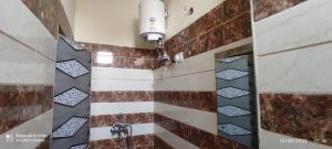 Vannituba majutusasutuses Vaishno Mata homestay +27 fotot