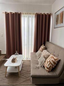 Posezení v ubytování A residence with 4 bedrooms in a private community with a swimming pool