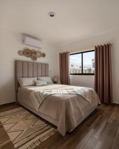 Postel nebo postele na pokoji v ubytování A residence with 4 bedrooms in a private community with a swimming pool