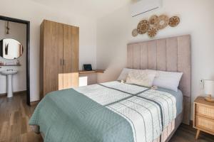 Postel nebo postele na pokoji v ubytování A residence with 4 bedrooms in a private community with a swimming pool + 21 fotografií