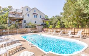 Bazén v ubytování Carotank Clubhouse nebo v jeho okolí