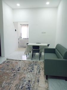 Χώρος καθιστικού στο Dahlia Homestay 3