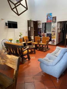 TV a/nebo společenská místnost v ubytování Hospederia Montano Alto