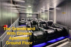 a cinema room with a cinema equipment ground floor at Swish Luxury Holiday Apartments in Blackpool