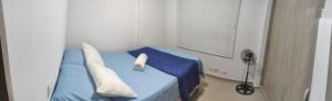 Postel nebo postele na pokoji v ubytování Bonito Apartamento Menga Norte