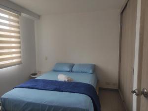 Postel nebo postele na pokoji v ubytování Bonito Apartamento Menga Norte