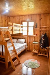 Postel nebo postele na pokoji v ubytování La posada del minero Oxapampa