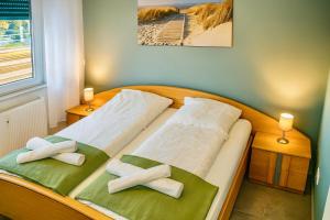 Postel nebo postele na pokoji v ubytování Ok Apartments