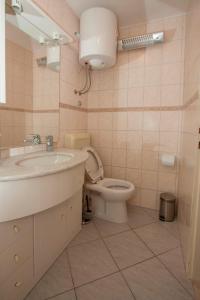 Koupelna v ubytování Apartment Vestibul Inn