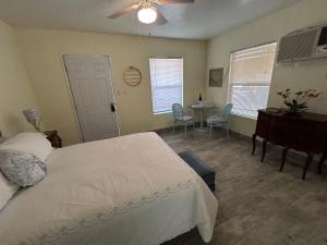 a bedroom with a bed and a table and chairs at Perfect getaway apartment! in Wofford Heights +16 photos