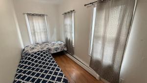 Afbeelding uit fotogalerij van Esjacpe Guest House 2 in Boston +17 foto's