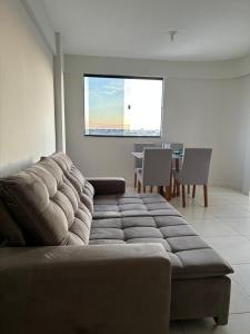 Posezení v ubytování Apto Conquista espaçoso e confortável