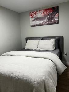 En eller flere senge i et værelse på Sophia Haven