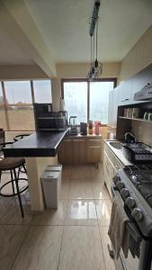 Køkken eller tekøkken på Departamento acogedor