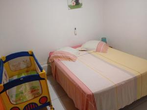 Giường trong phòng chung tại L'Authentique Sikryé