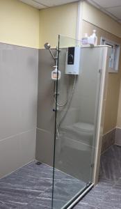 Koupelna v ubytování UOKResort + 2 fotografie