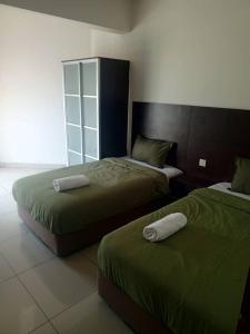 Ένα ή περισσότερα κρεβάτια σε δωμάτιο στο Marina sunset view