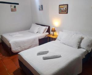 Ένα ή περισσότερα κρεβάτια σε δωμάτιο στο La Posada de Jose Antonio