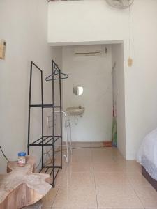 Ένα ή περισσότερα κρεβάτια σε δωμάτιο στο OPA OMA Homestay