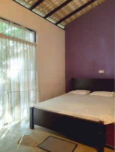 Ένα ή περισσότερα κρεβάτια σε δωμάτιο στο Diamond rock villa