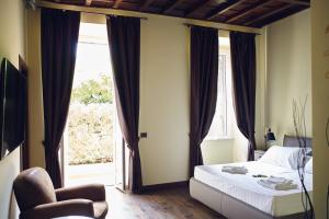A bed or beds in a room at Domus Corsini