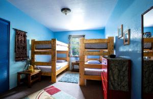Postel nebo postele na pokoji v ubytování Kalani Hawaii Private Lodging