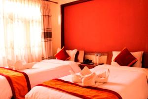 Posteľ alebo postele v izbe v ubytovaní Hotel Atlantic