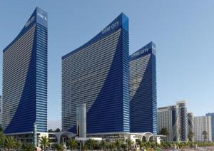 two tall buildings in front of a city at Batumi Bay Retreat in Batumi