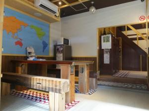 Televiisor ja/või meelelahutuskeskus majutusasutuses Guesthouse Mikkaichi