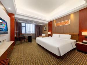 TV a/nebo společenská místnost v ubytování HX Hotel