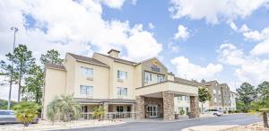 a rendering of the front of a hotel at Comfort Inn & Suites Montgomery East Carmichael Rd in Montgomery