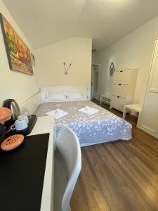 Ένα ή περισσότερα κρεβάτια σε δωμάτιο στο Marisah Residence #11