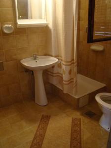 Koupelna v ubytování Apartments Svorcan + 17 fotografií